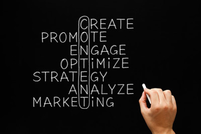 4 Pros and Cons of Hiring a Content Marketing Firm to Write Your Company Blog